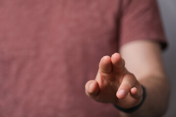 A man hand touching virtual screen, modern background concept , can put your text at the finger,...