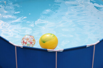 Fototapeta na wymiar pool in the country with balls