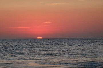 Obraz premium Sunset at Cala El Frailecillo in the Calas de Roche de Conil de la Frontera. Cadiz Andalusia. Spain