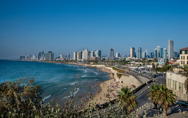 Fototapeta na wymiar Landscape of Mediterranean sea beach and skyline of Tel Aviv.