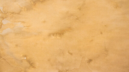 Old brown paper texture. Yellow autumn watercolor texture with abstract washes and brush strokes on the white paper background. Chaotic abstract organic design.