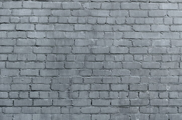 Background and texture of old rough gray brick wall