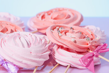 Obraz na płótnie Canvas bright colored handmade meringue candies.