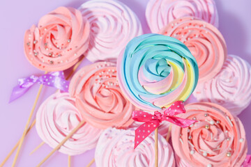 Fototapeta na wymiar bright colored handmade meringue candies.