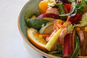 Tropical salad with fruits, prawns and Cocktail sauce