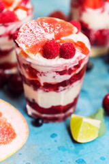 Dessert with strawberry, raspberry, grapefruit and ice cream