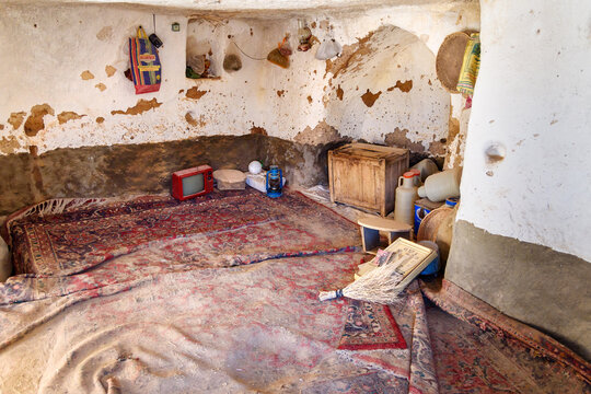 Interior of room in cave house in rock village Kandovan. Iran