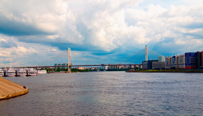 Fototapeta premium Panorama of the Big Obukhovsky bridge over the Neva river, Saint-Petersburg, Russia.