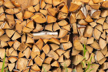 Birch firewood. Front image of firewood saw cuts. Firewood is dried and ready to kindle a fireplace.
