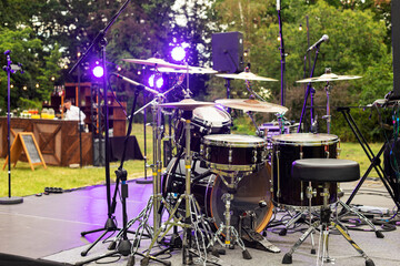 Outdoor drum kit. Percussion instruments, drum, cymbals. Rock  concert