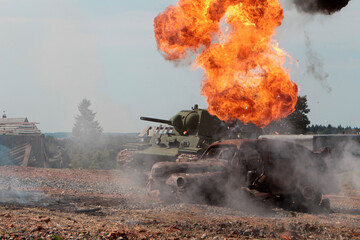 The military destroyed an enemy tank. Tank is on fire.
