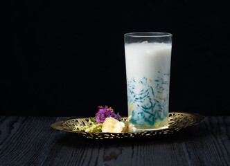 Thai dessert called Lot Chong made from flour mixed with pandan and coconut milk mixed with palm sugar in glass