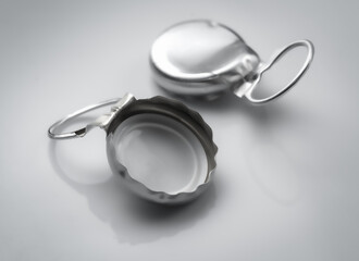 Bottle ring pull cap on gray background
