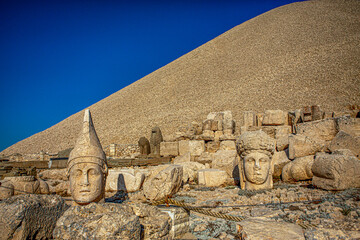Antique statues on Nemrut mountain, Turkey. The UNESCO World Heritage Site at Mount Nemrut where...