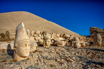 Antique statues on Nemrut mountain, Turkey. The UNESCO World Heritage Site at Mount Nemrut where...