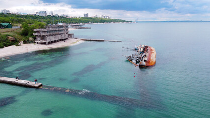 Tanker Delfi wrecked on the shore of Odessa beach, aerial photography.