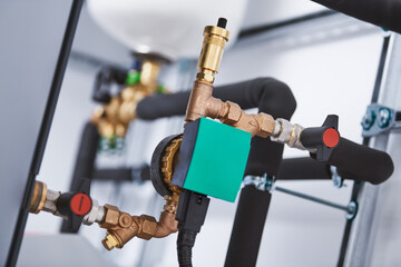 Pump, controller and steel pipeline in boiler room