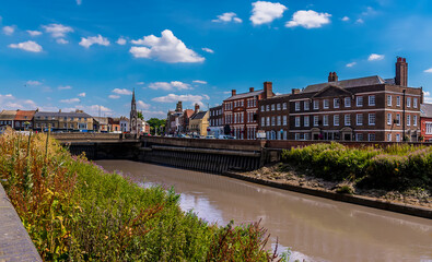 A view from the North Brink over the River Nene towards the centre of Wisbech, Cambridgeshire in the summertime