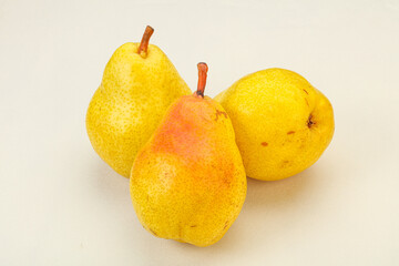 Fresh sweet pear over background