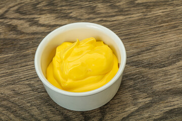 Natural cheese sauce in the bowl