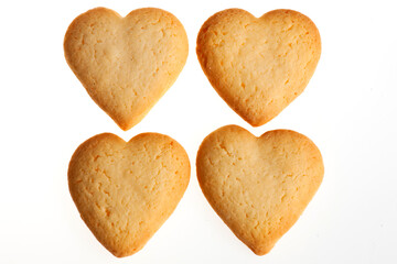 Assortment of biscuits isolated on white background. Heart shaped cookies  for Valentine's day, Christmas and other celebrations 
