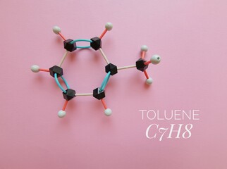 Molecular structure model and chemical formula of toluene molecule. Toluene (toluol) is an aromatic...