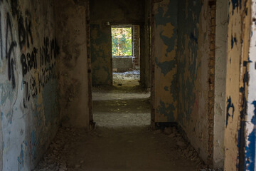 A corridor in an empty, neglected and abandoned building