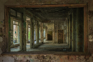 A corridor in an empty, neglected and abandoned building