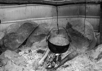 cooking in a cauldron in a rustic style