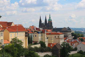 Prague's St. Vitus Cathedral in Hradcany against the background of clouds on a hot, Sunny summer day.