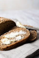 sliced rye bread with butter