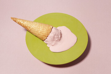 Pink melted icecream. Minimal summer food concept.