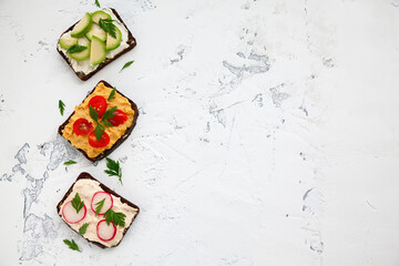 Vegetarian toasts on a white background
