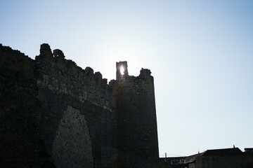 sun light through the battlement of an ancient castle stone wall © Sin Filtro
