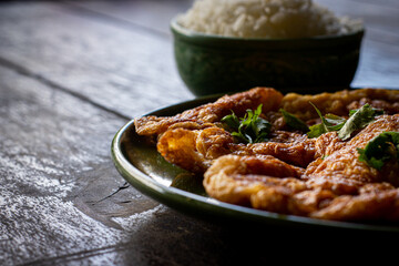 omelet in a plate on wooden table for advertisement.