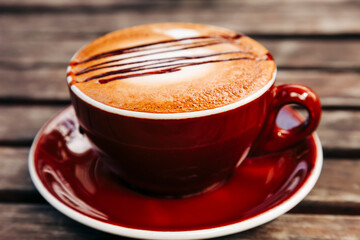 Cappuccino in red cup