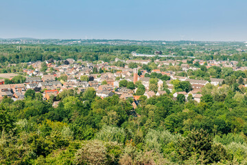 View from Halde Hoheward to residential district with church in Recklinghausen, Germany