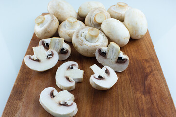sliced mushrooms on a cutting board