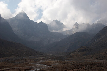 Clouds over rocky mountains, Everest region, Himalaya, Nepal