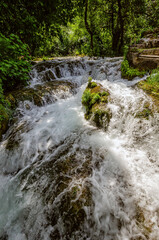 Rapids in the Krka river and wooden path through the Krka national park, Croatia
