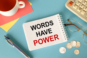 Words have power, is written on a notepad, on an office desk