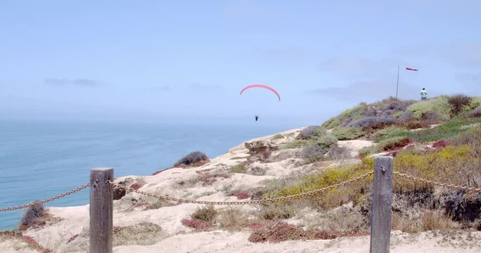 Paraglider in Flight over Ocean, La Jolla, California