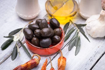 Foto op Plexiglas Pickled olives ready to eat, healthy food used in mediterranean cuisines © Igor Dutina