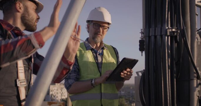 Engineers working on 5g antenna