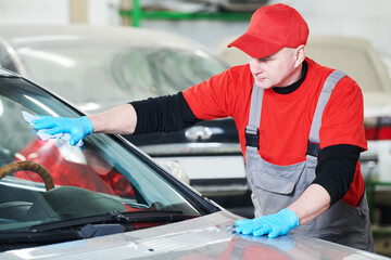 automobile windshield glass repair service. Car glass or chip crack repairing