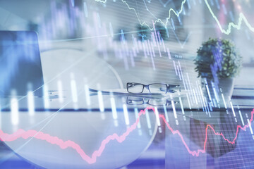Double exposure of financial graph drawing and office interior background. Concept of stock market.