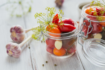 Ingredients for making healthy vegetarian food. Pickled Vegetables. Tomatoes being prepared for preserving. Clean eating, vegetarian food concept