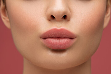 Blowing kiss. Close up portrait Beautiful young girl with pout lips