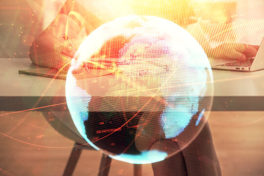 Multi exposure of woman hands typing on computer and business theme hologram drawing. Success concept.