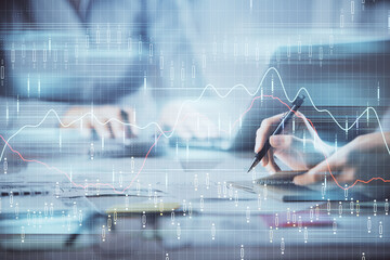 Multi exposure of woman hands typing on computer and financial chart hologram drawing. Stock market analysis concept.